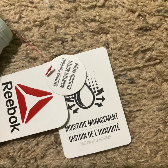 Reebok Women's Stronger Sports Bra with Mesh Panel and Removable Cups, Size-S - Picture 9 of 11